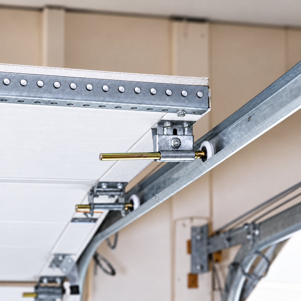 Garage door track and roller hardware